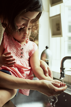 Child washing hands